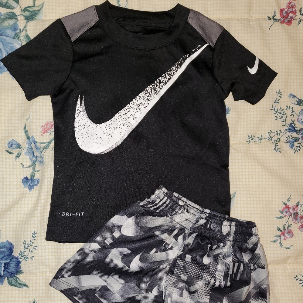 Two toddlers Nike outfits